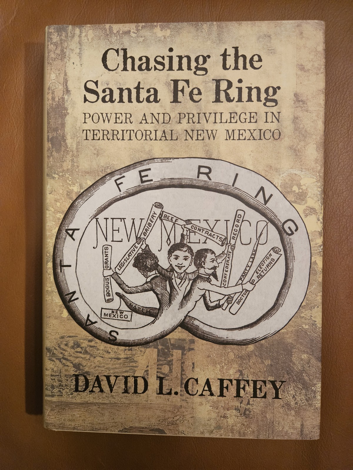 CHASING THE SANTA FE RING: POWER AND PRIVILEGE IN By David L. Caffey – Hardcover