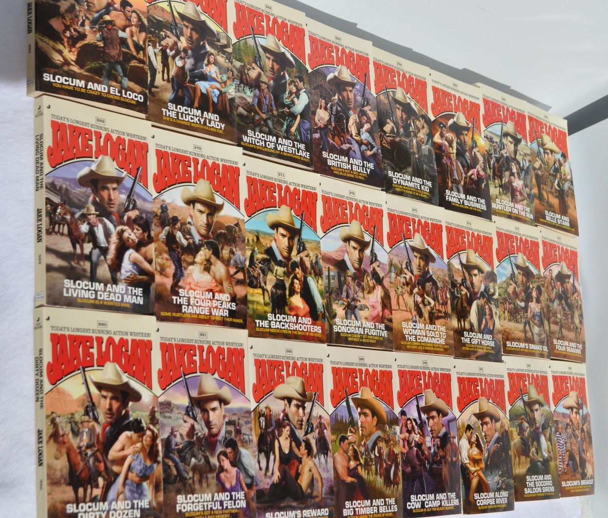 Lot of 24 John Slocum Westerns by Jake Logan-#361 to #393; March 2009-Nov. 2011