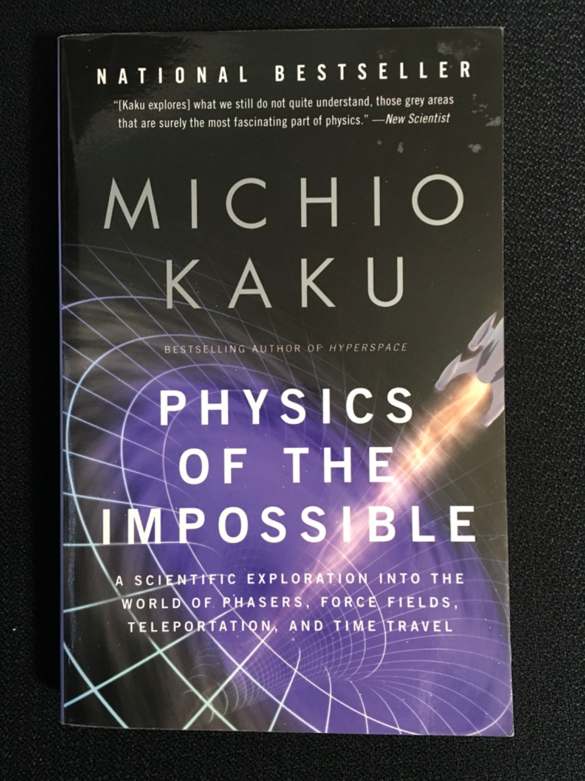PHYSICS OF THE IMPOSSIBLE Force Fields Teleportation Time Travel MICHIO KAKU New