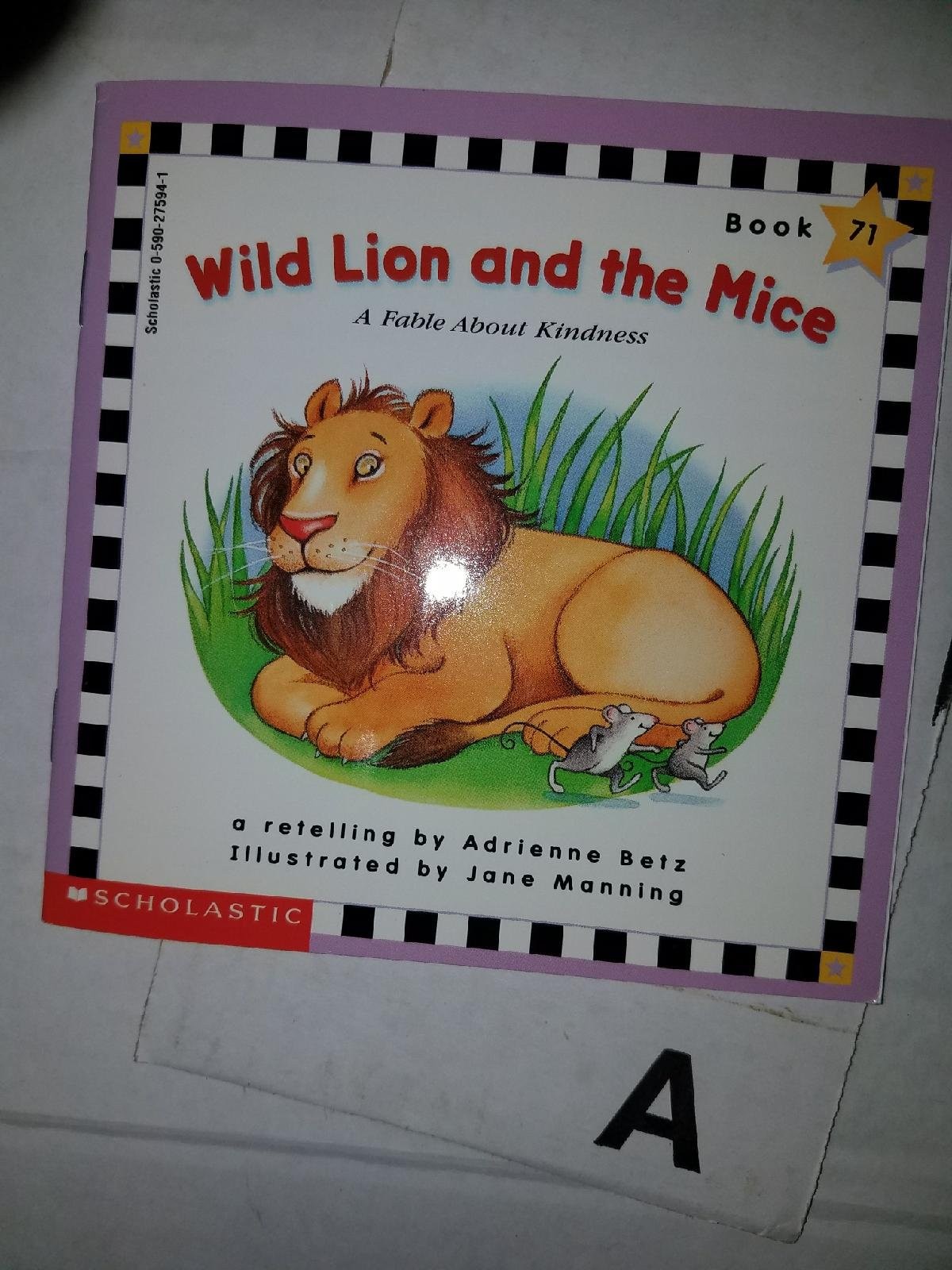 Wild lion and the mice: A fable about kindness (Scholastic phonics readers)