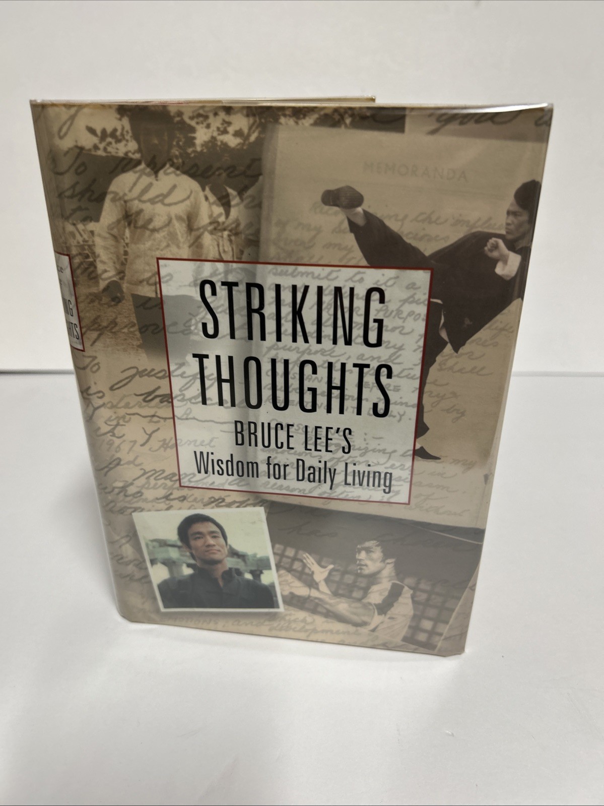 Striking Thoughts: Bruce Lee’s Wisdom for Daily Living By Bruce Lee 2000 1st HC