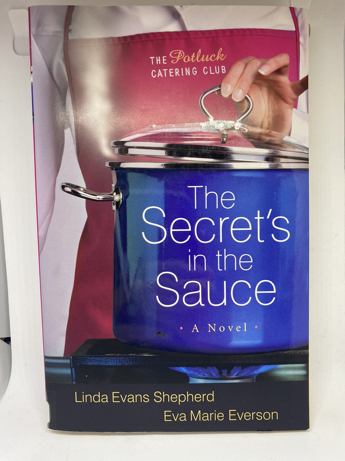 The Potluck Catering Club Ser.: The Secret’s in the Sauce : A Novel by Eva Marie