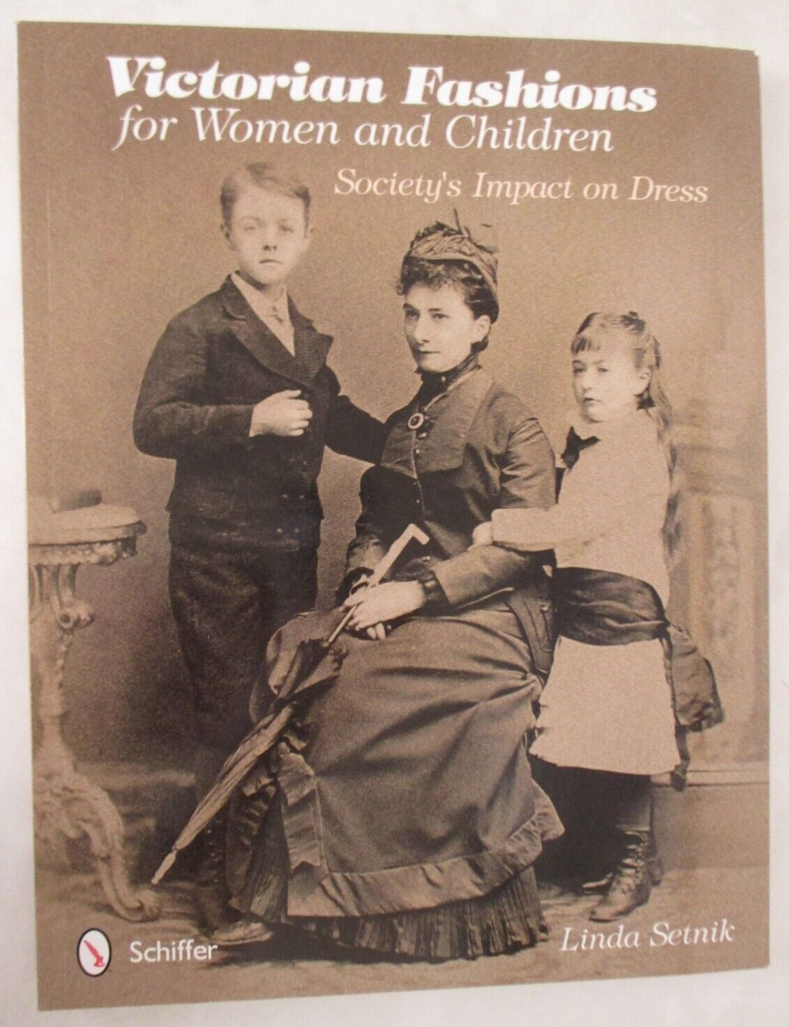 Victorian Fashions for Women and Children : Society’s Impact on Dress