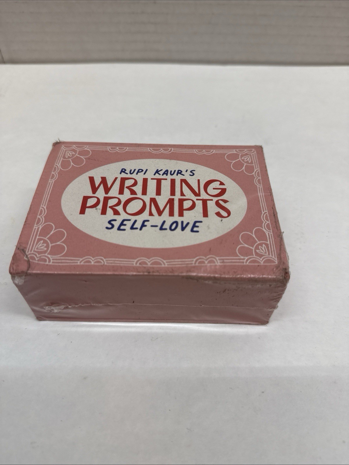 Rupi Kaur’s Writing Prompts Self-Love – 70 Card Deck w/ Hardcover Box